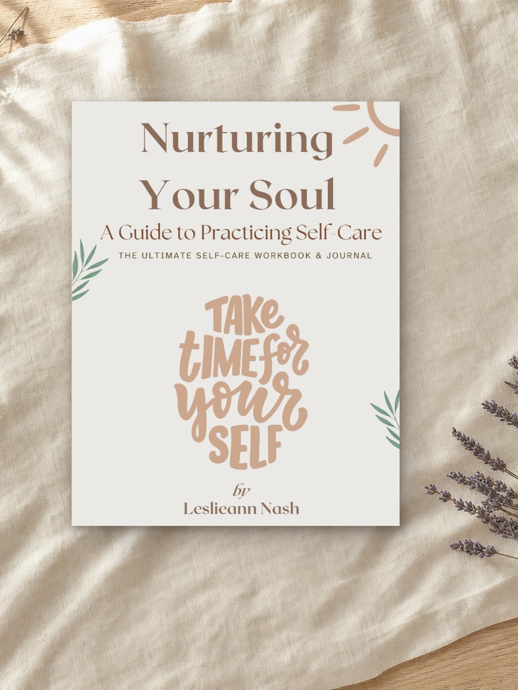 Nurturing Your Soul: A Guide to Practicing Self-Care by Leslieann, its cover reading Take Time For Yourself, resting on cream linen beside dried lavender