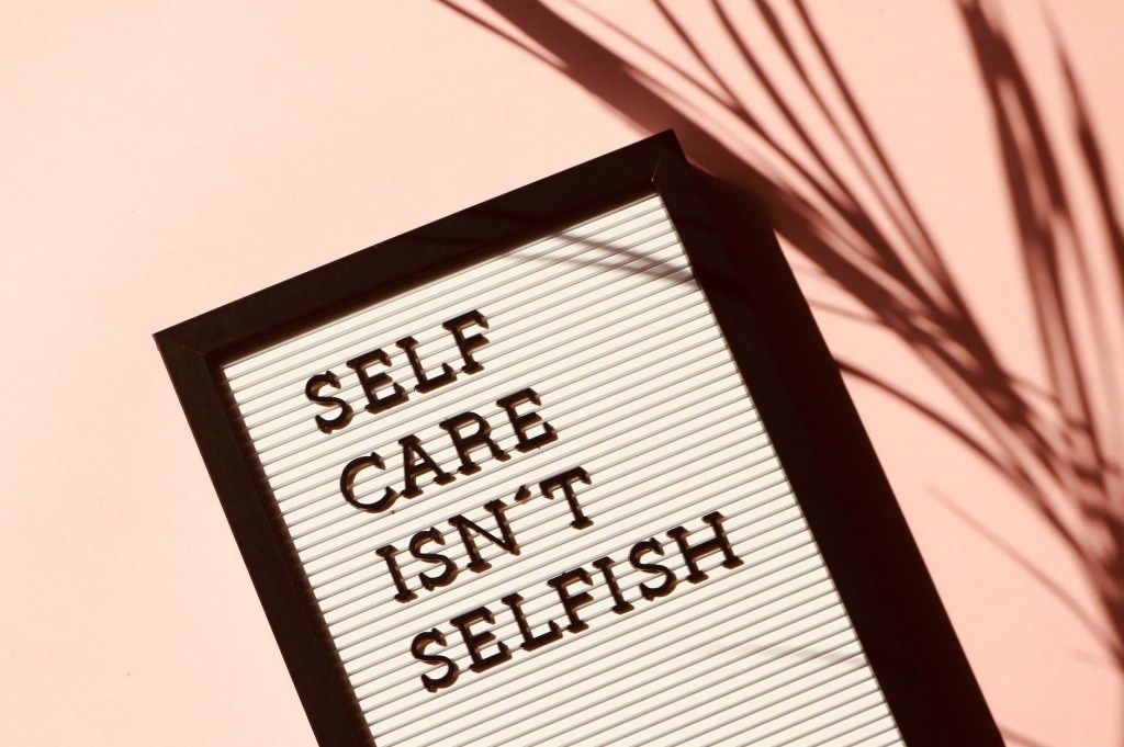 Letter board reading “Self care isn’t selfish”